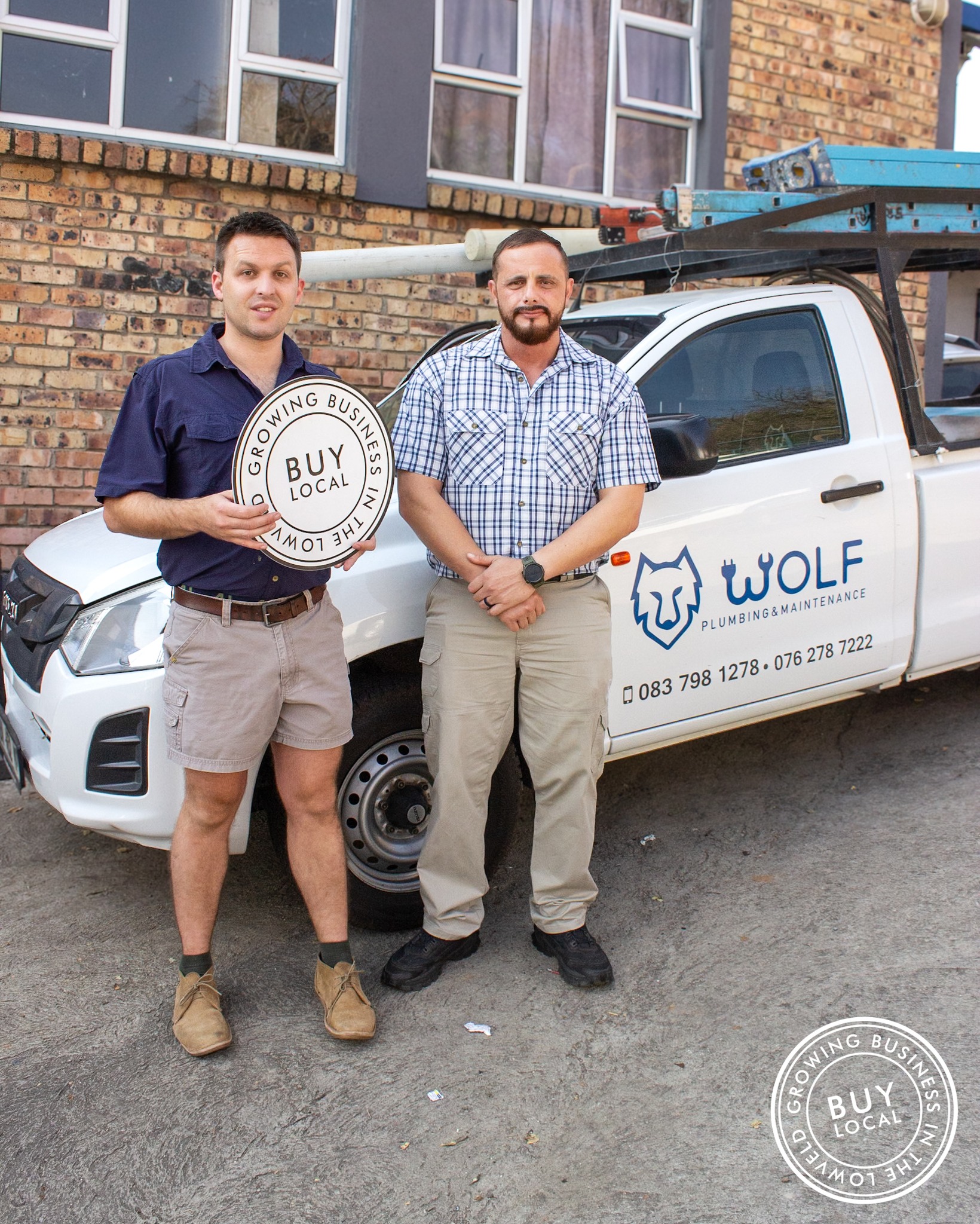 Plumbing team from Wolf Plumbing Nelspruit standing together in front of a service vehicle